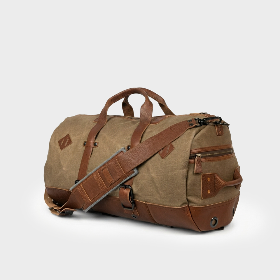 Dakota Waxed Canvas Brown Duffle Backpack Front Side View Dakota Waxed Canvas Brown Duffle Backpack Front Side View