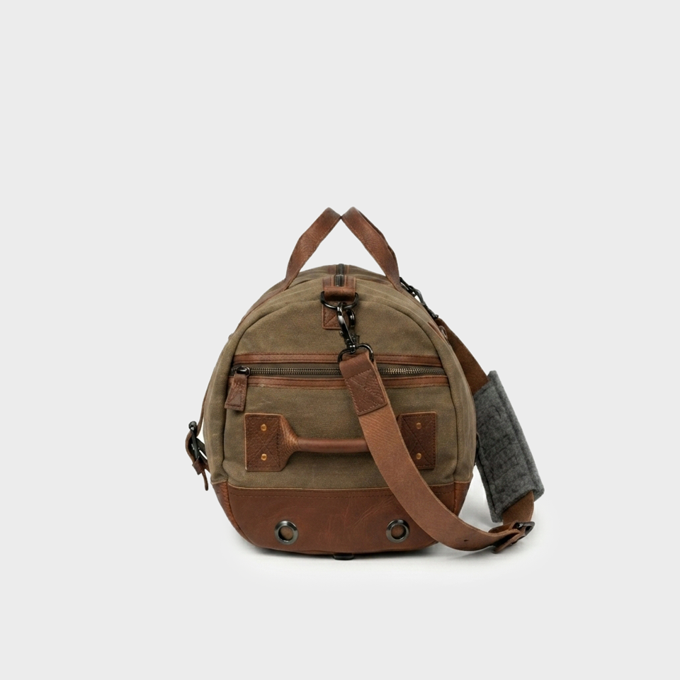 Dakota Waxed Canvas Brown Duffle Backpack Side View Dakota Waxed Canvas Brown Duffle Backpack Side View